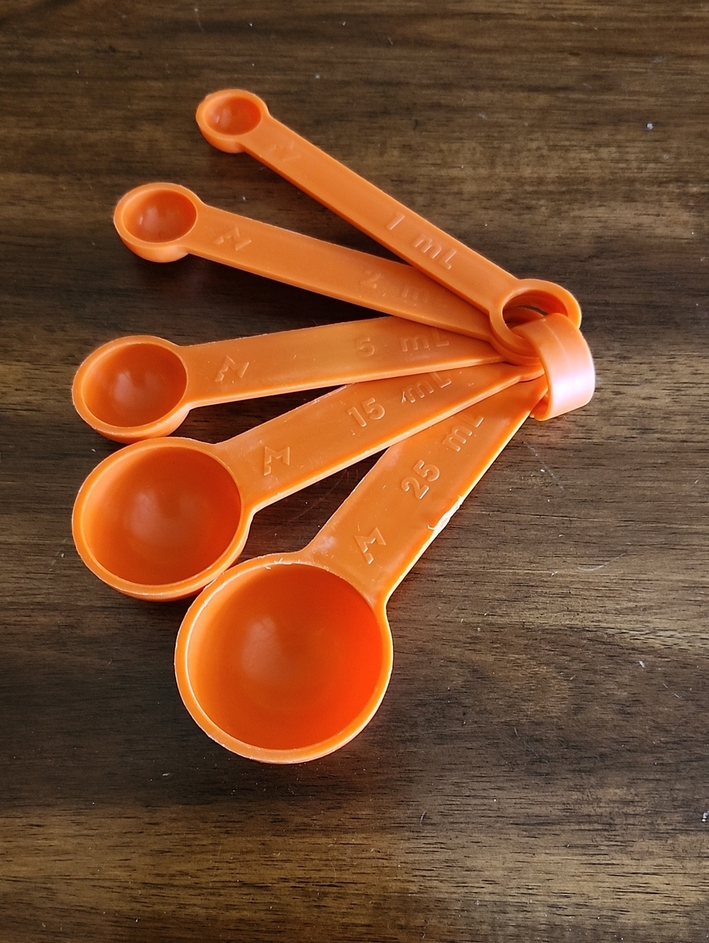 Vintage Rubbermaid Orange Plastic Measuring Spoon Set - 5 Piece